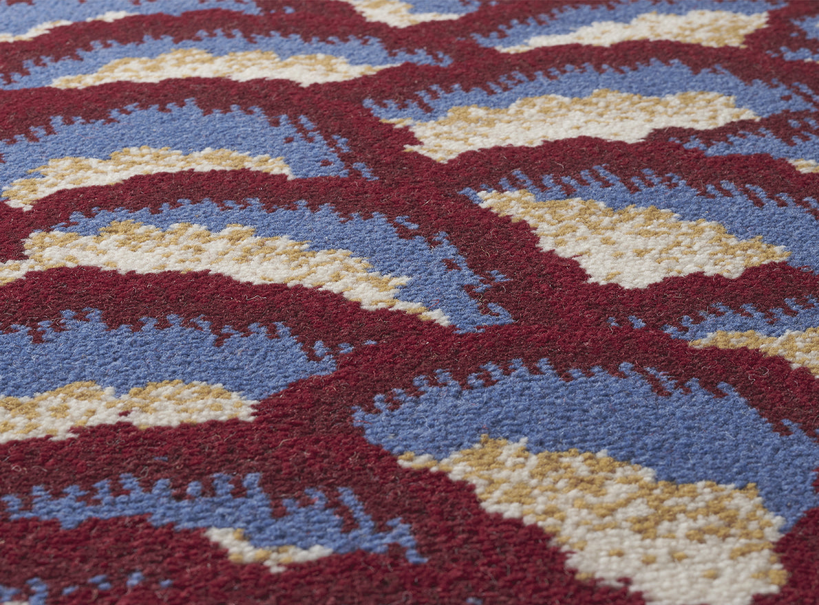 Arlesienne Rug by Pierre Frey shown in a room setting (view 2)