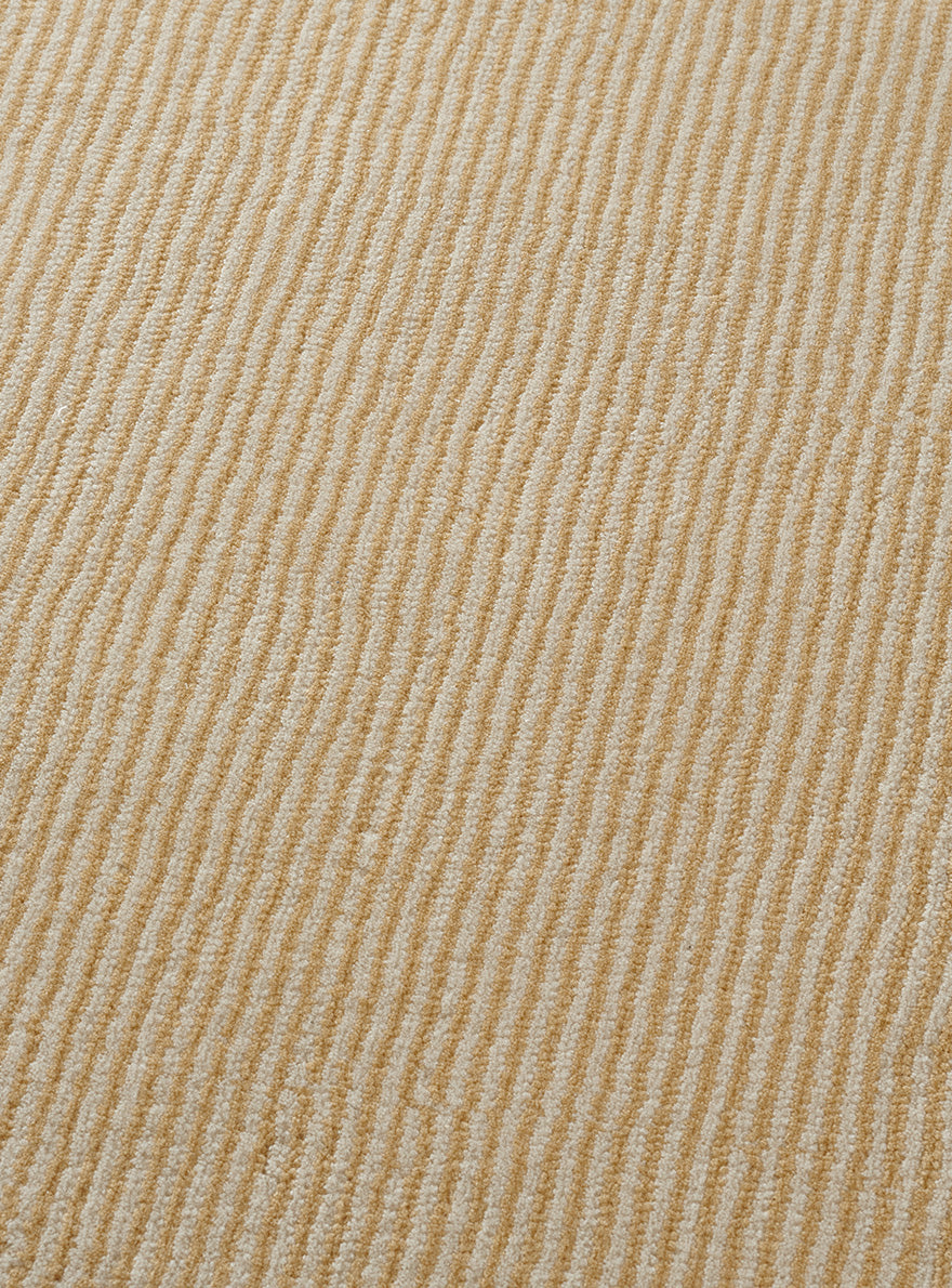Mont Blanc Rayures Rug by Pierre Frey shown in a room setting (view 2)