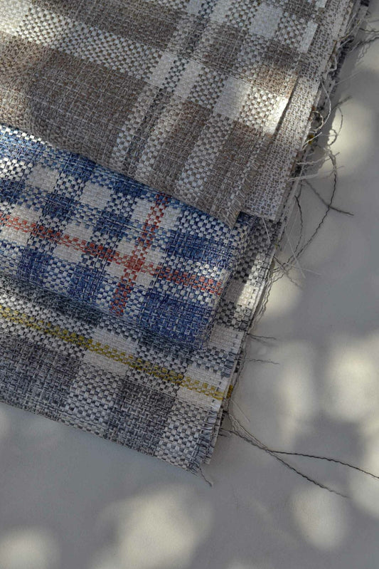 Overcoat fabric by Coordonné in Avio, shown in a styled room