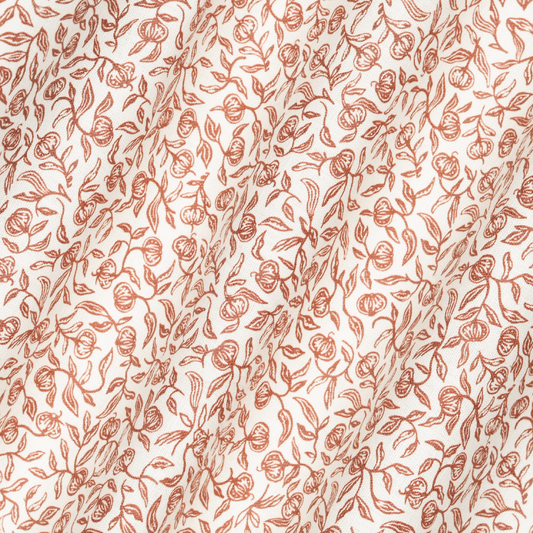 Pomegranate Printed Linen Fabric by Volga Linen in Marsala/Oyster, rippled to show the drape