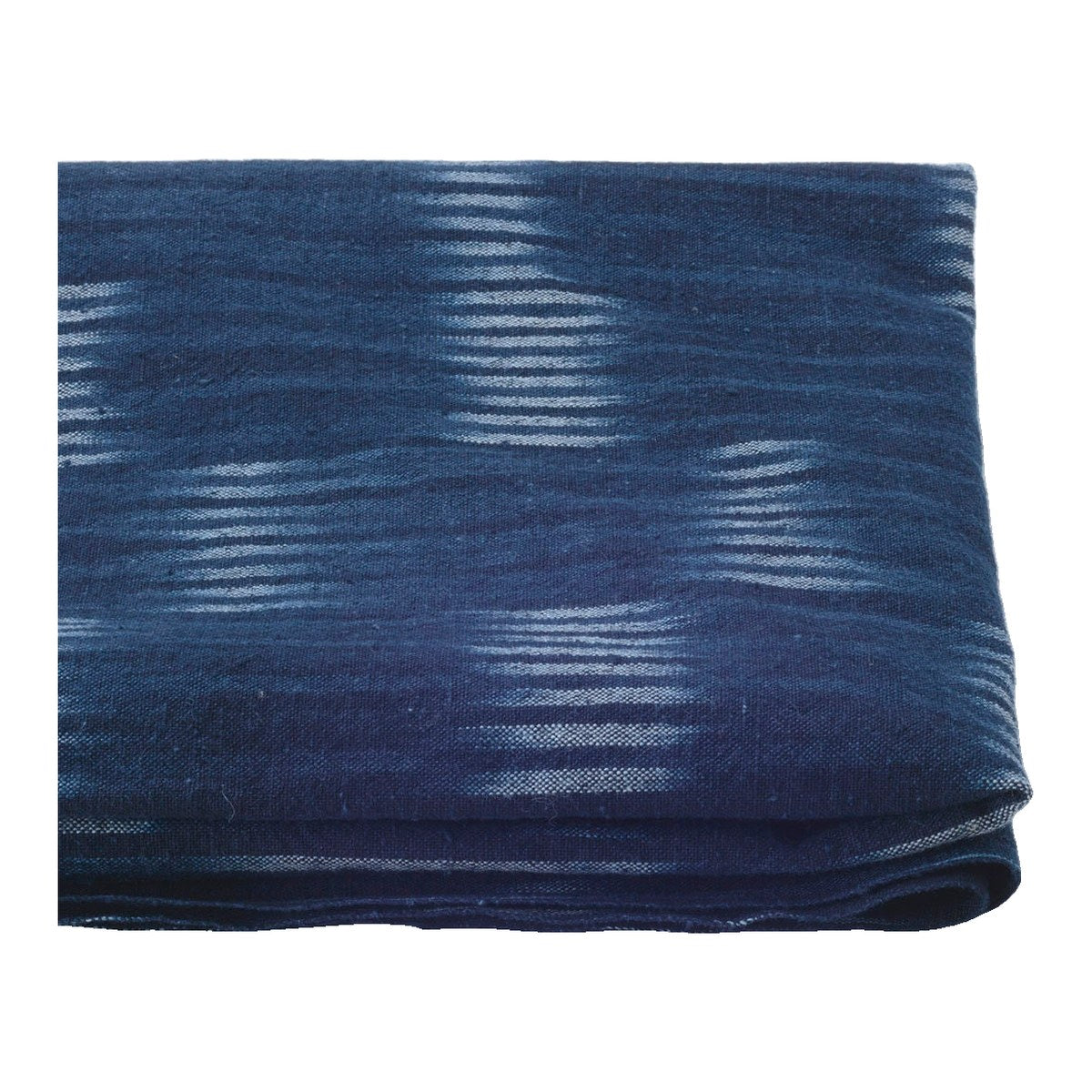 The ReBorn House TRH5800 Bingo-Gasuri Han-Gasuri Indigo Ikat Cotton in Kon Bold Ikat, colorway TRH5800.A, folded on white