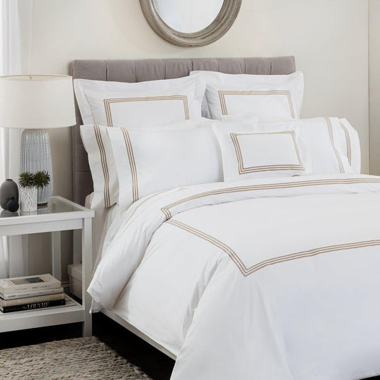 Windsor Sateen Duvet Cover by Downright, styled on a bed