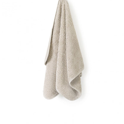 Grand Egoist Hand Towel by Graccioza in FOG