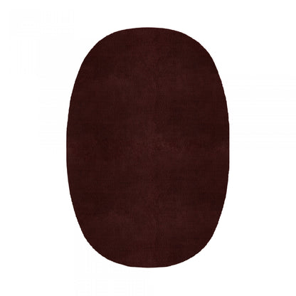 Plain Area Rug by Graccioza in Bordeaux, Oval