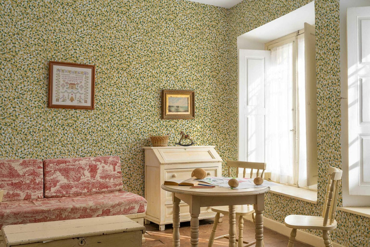 Ana wallpaper by Coordonné in Cúrcuma, shown in a styled room