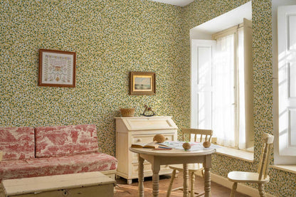 Ana wallpaper by Coordonné in Cúrcuma, shown in a styled room