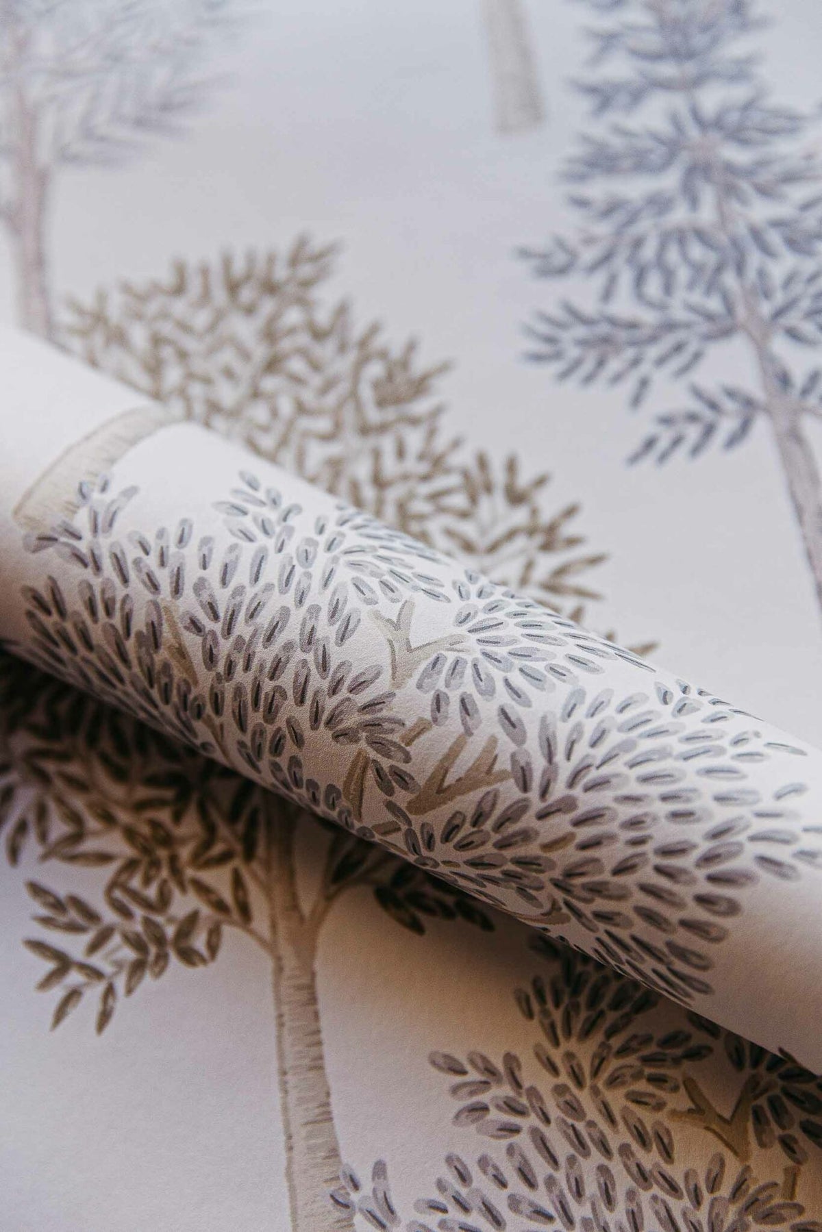Arboleda wallpaper by Coordonné in Cuero/Marrón, shown in a styled room