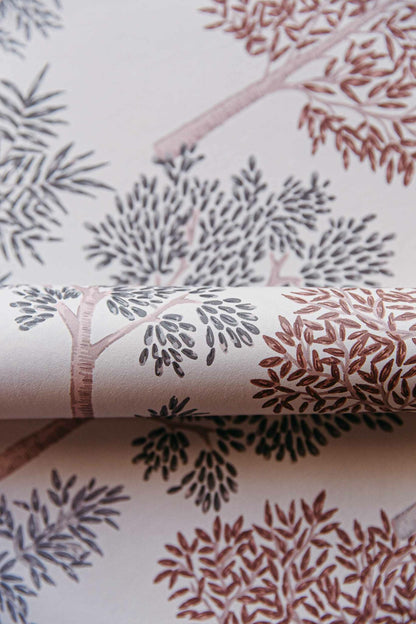 Arboleda wallpaper by Coordonné in Terracota/Granate, shown in a styled room