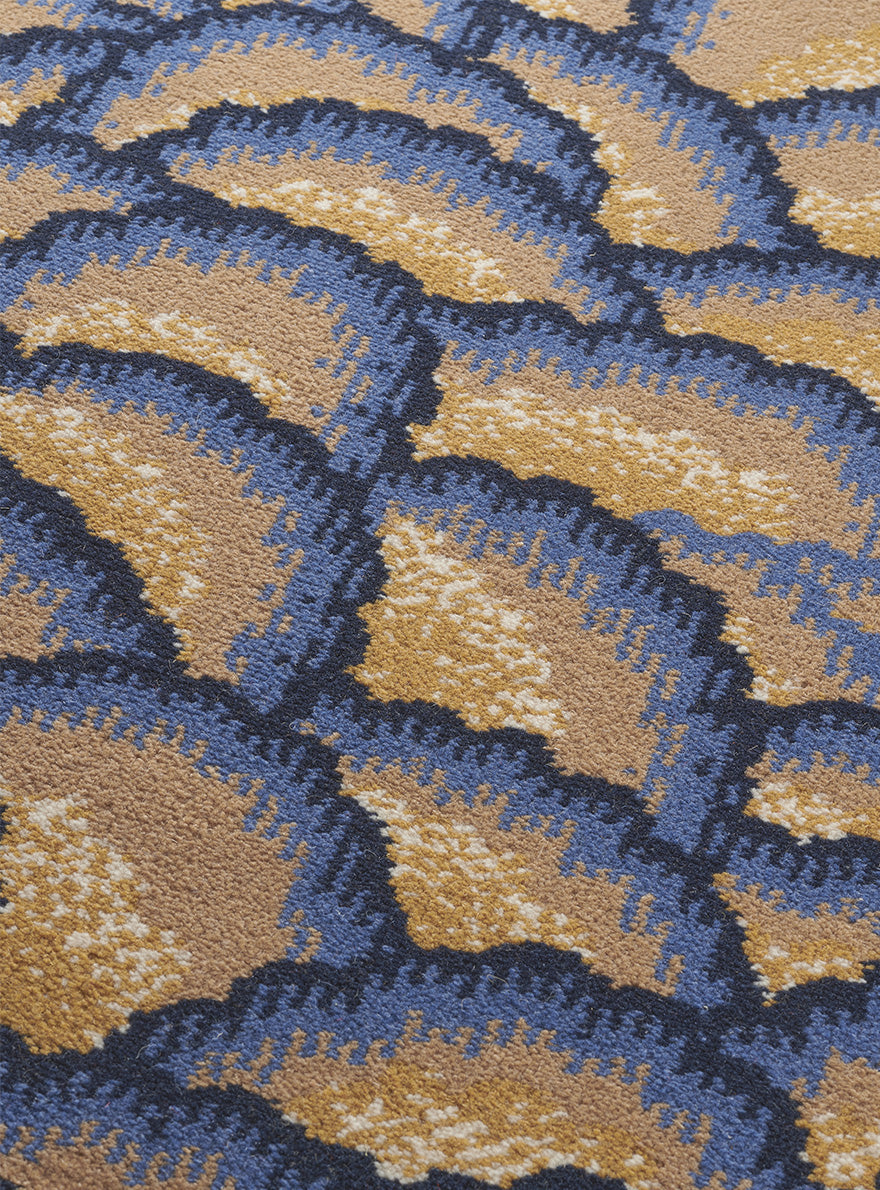 Arlesienne Rug by Pierre Frey shown in a room setting (view 1)