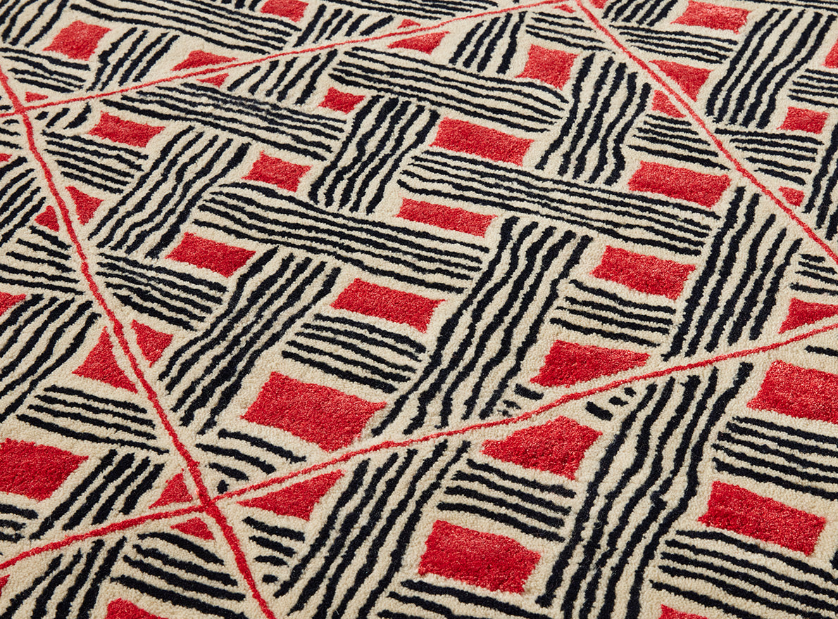 Behanzin Rug by Le Manach shown in a room setting (view 1)