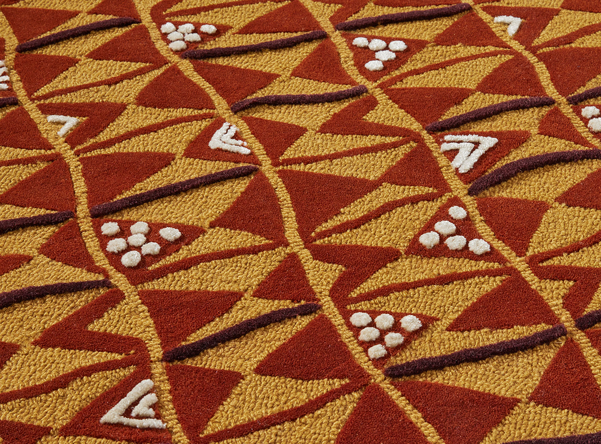 Benin Laine Rug by Le Manach shown in a room setting (view 1)