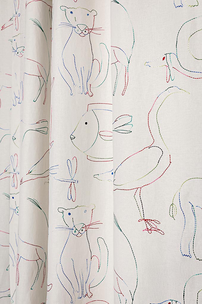 Bestiaire Enchante Fabric by Pierre Frey shown in a room setting (view 1)