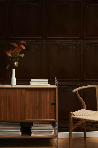 Boiserie wallpaper by Coordonné in Chocolate, shown in a styled room