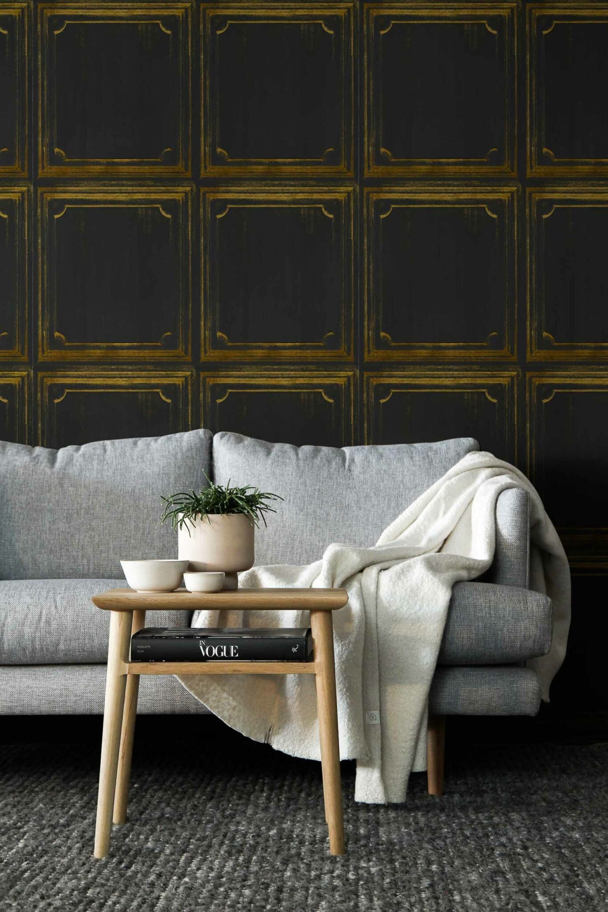 Boiserie wallpaper by Coordonné in Coal, shown in a styled room