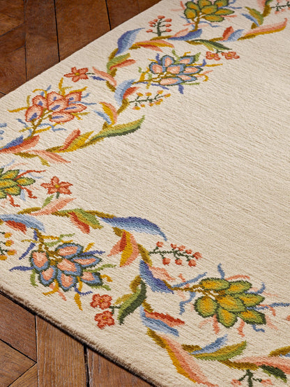 Bordure Petits Appartements de la Reine Rug by Braquenié shown in a room setting (view 1)