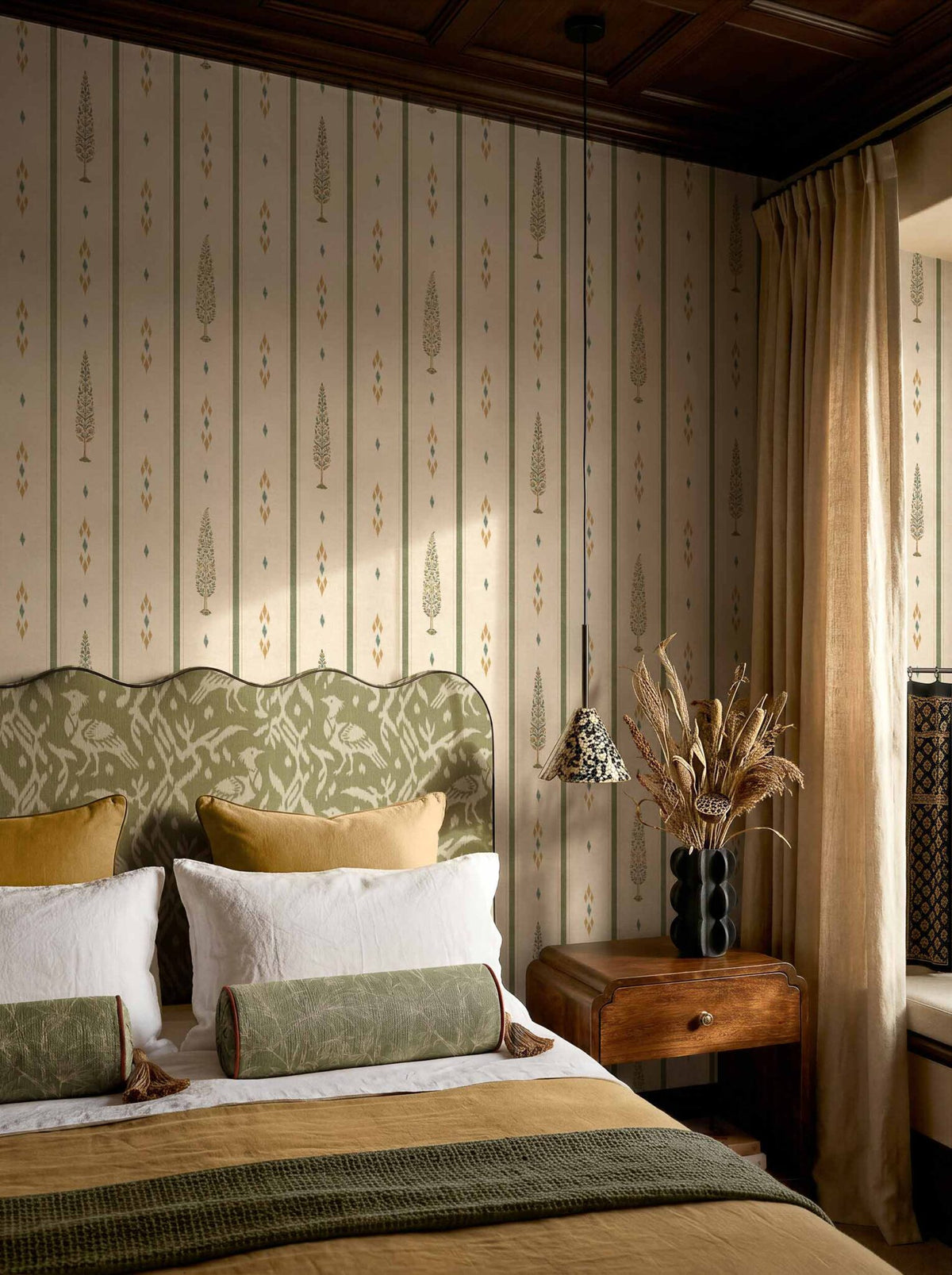 Boteh wallpaper by Coordonné in Moss, shown in a styled room