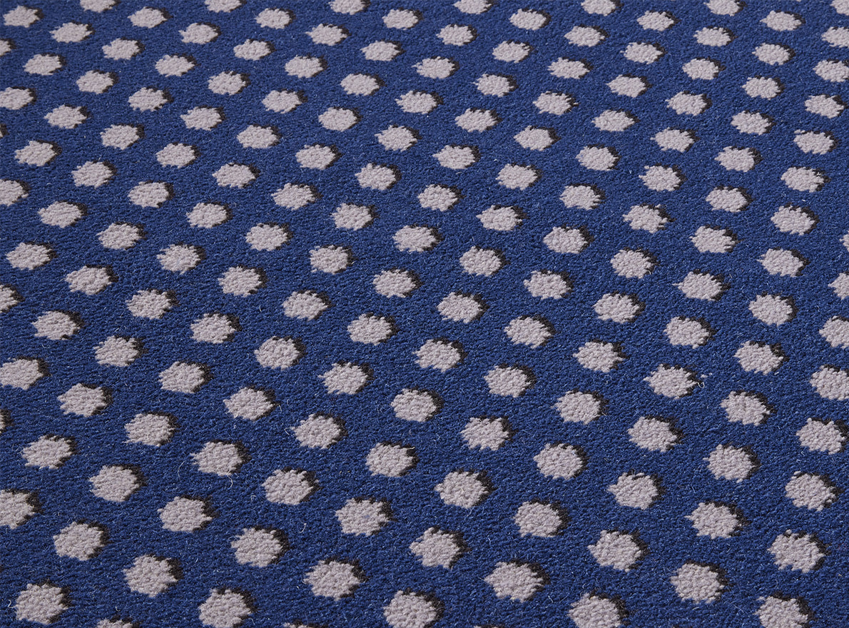 Cabochons Rug by Pierre Frey shown in a room setting (view 1)
