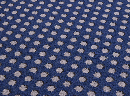Cabochons Rug by Pierre Frey shown in a room setting (view 1)
