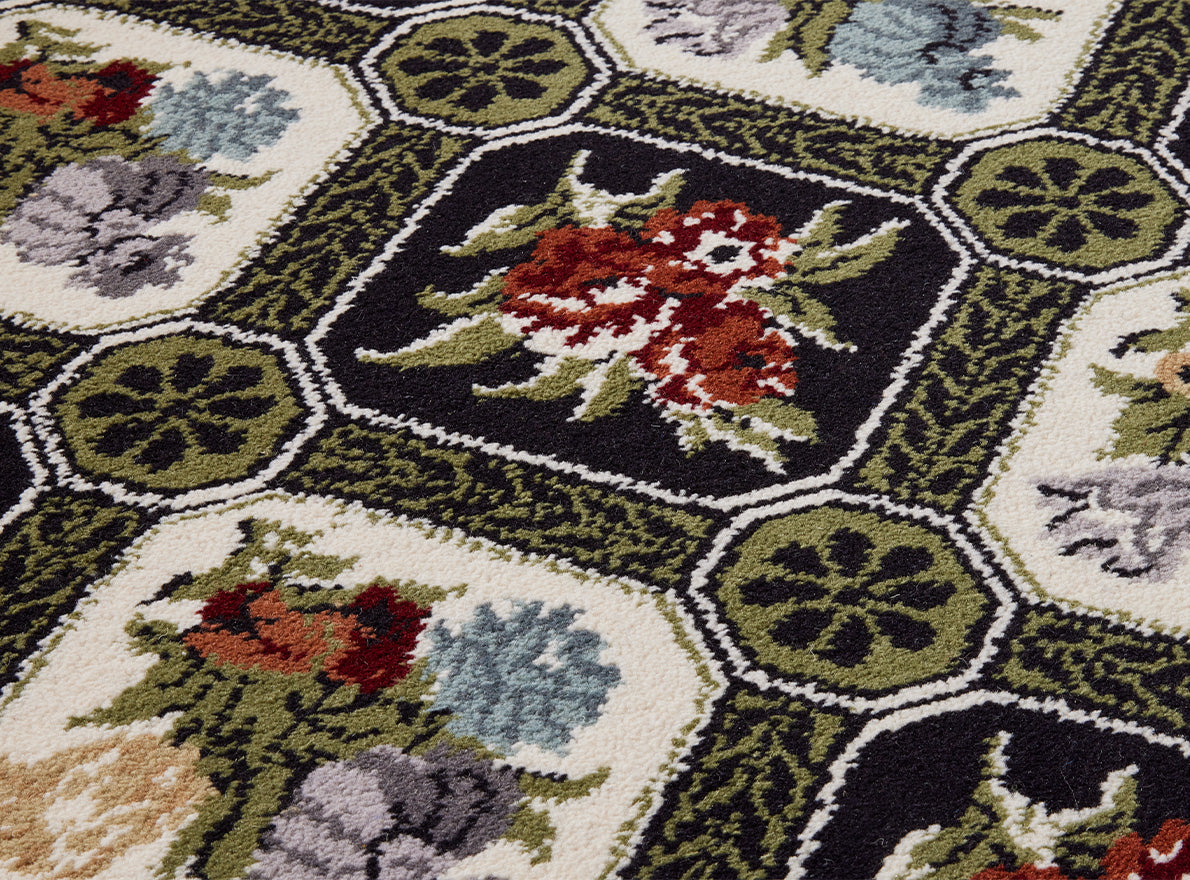 Caisson Bouquet Axminster Rug by Braquenié shown in a room setting (view 1)