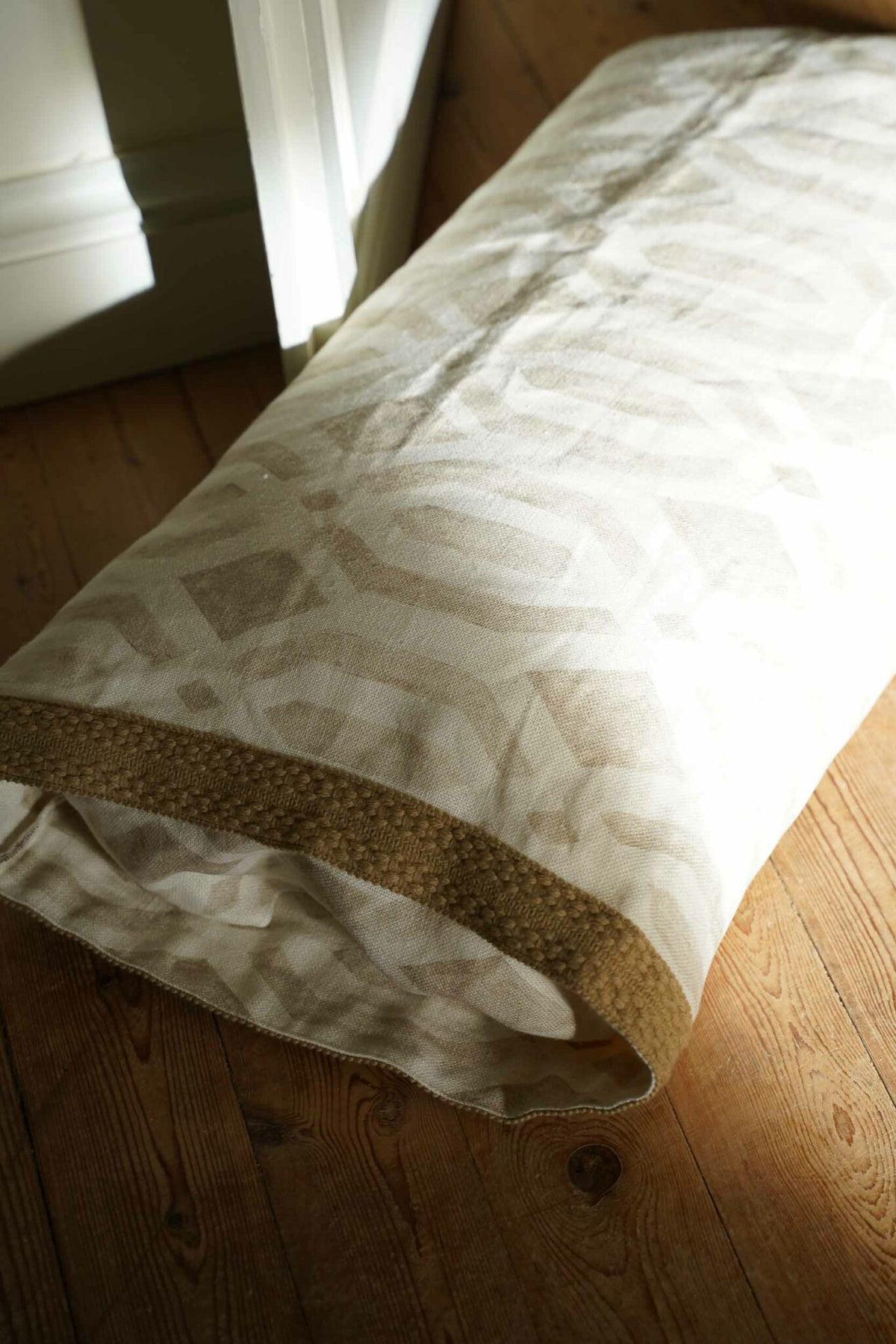 Canales fabric by Coordonné in Arena, shown in a styled room
