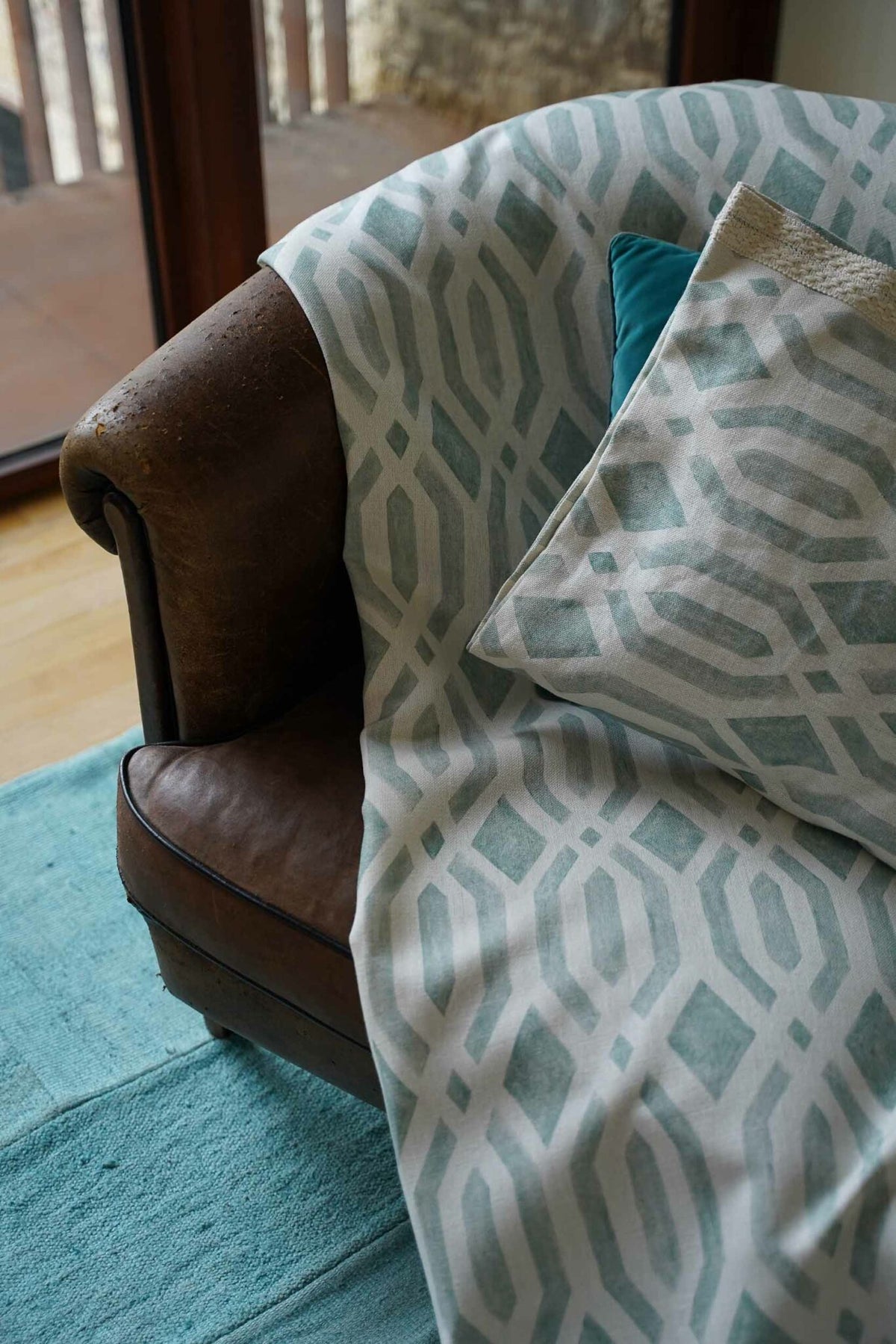 Canales fabric by Coordonné in Celadón, shown in a styled room
