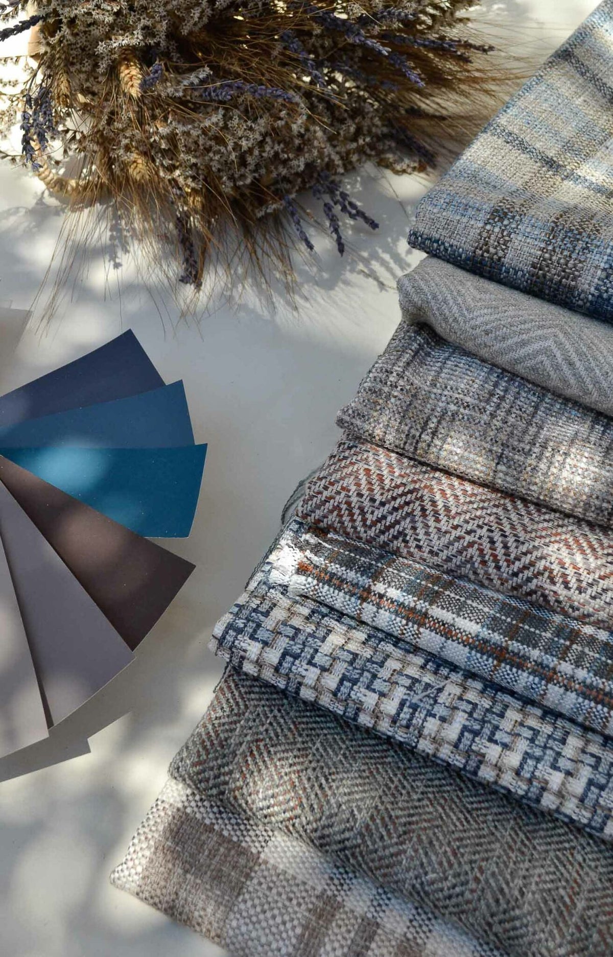 Coat fabric by Coordonné in Ice, shown in a styled room