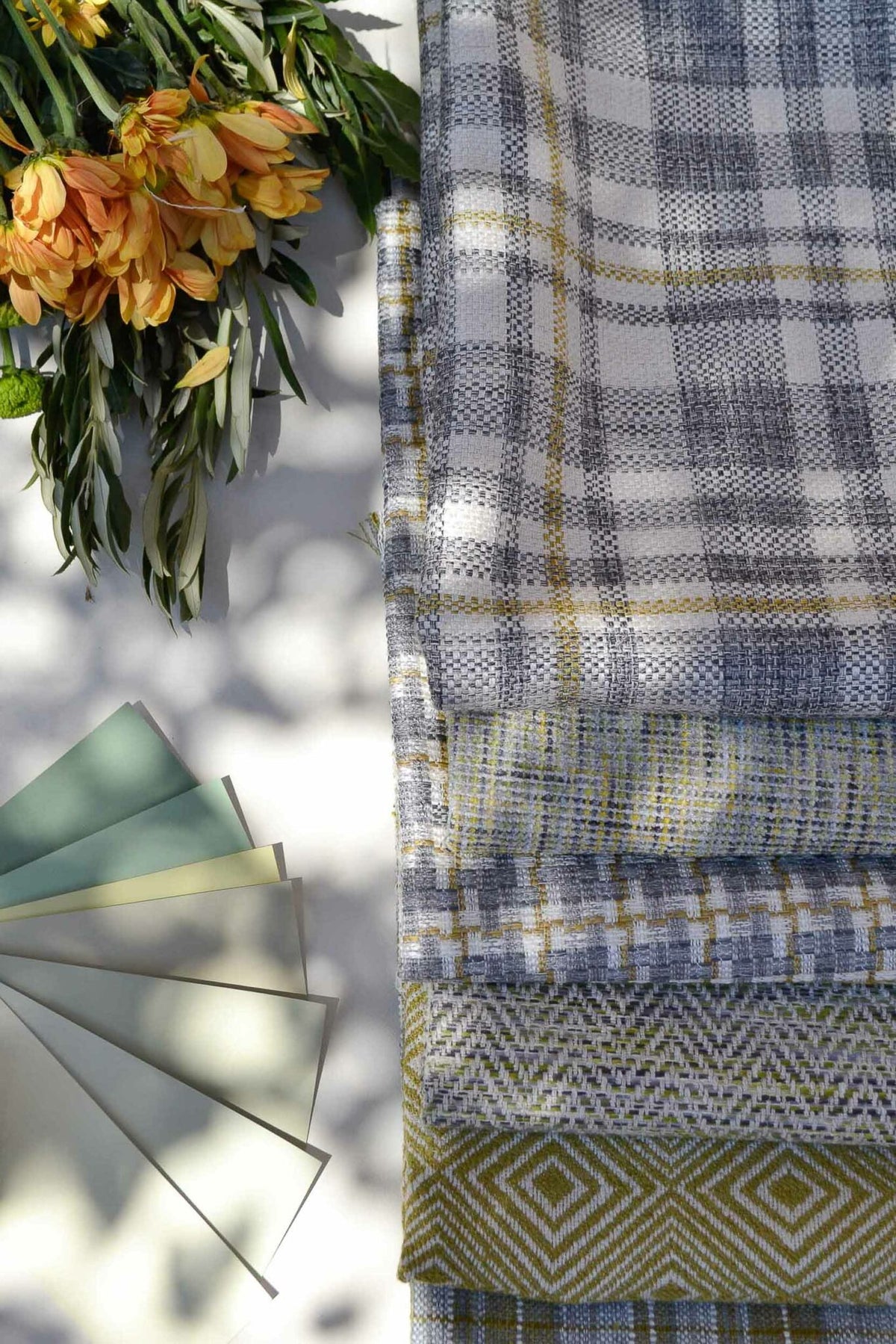 Coat fabric by Coordonné in Lime, shown in a styled room