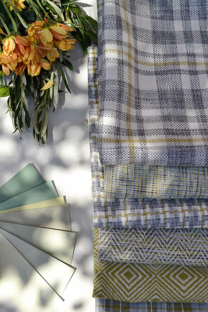 Coat fabric by Coordonné in Lime, shown in a styled room