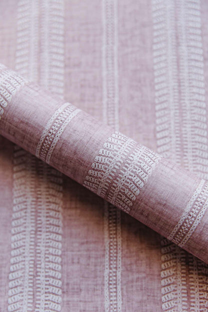 Costura wallpaper by Coordonné in Cava/Rosa, shown in a styled room