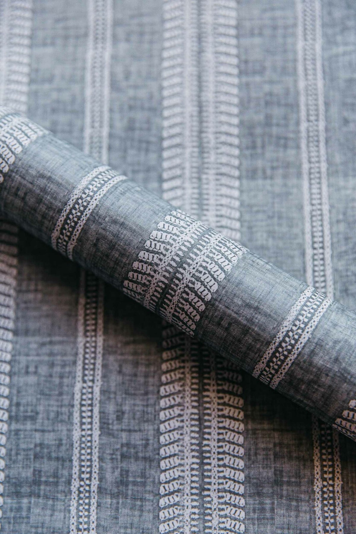 Costura wallpaper by Coordonné in Celadón, shown in a styled room