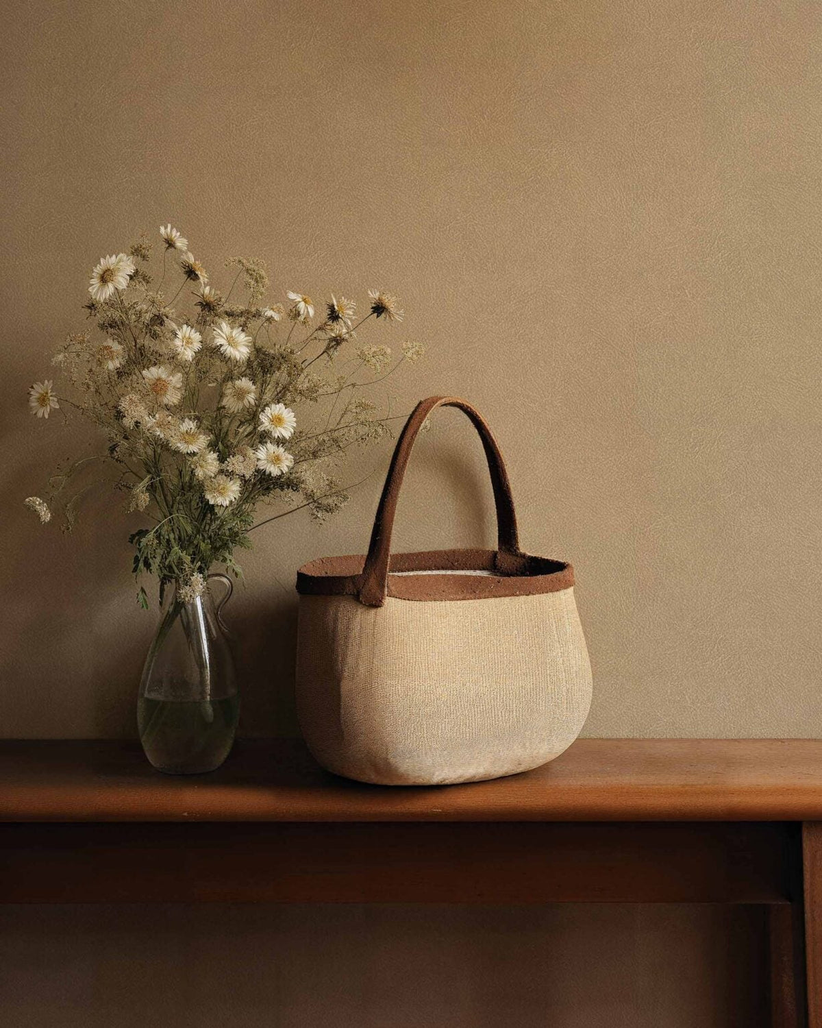 Cuero wallpaper by Coordonné in 20, shown in a styled room