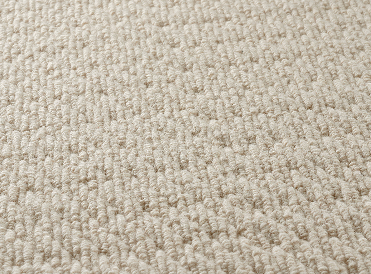 Damavand Rug by Pierre Frey shown in a room setting (view 1)