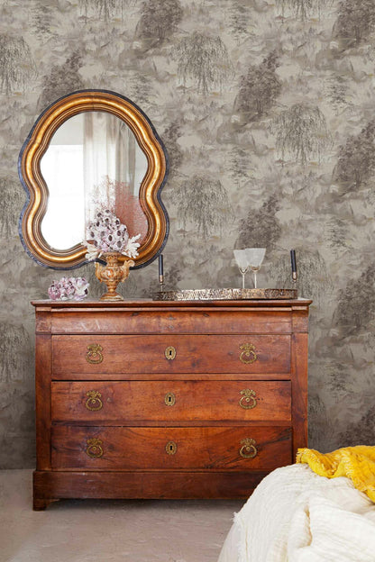 Dunhuang wallpaper by Coordonné in Chia Seed, shown in a styled room