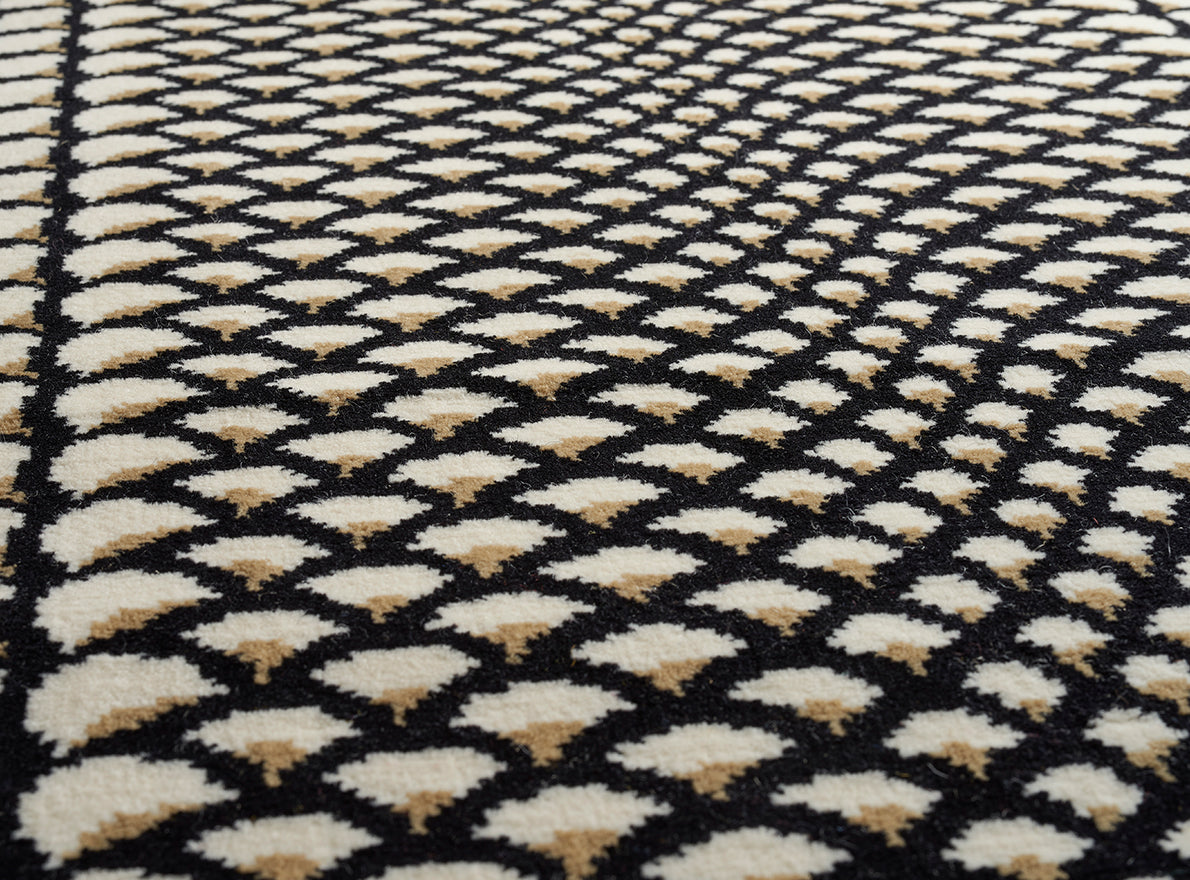 Ecailles le Manach Rug by Le Manach shown in a room setting (view 1)
