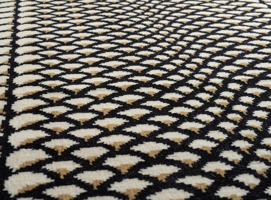 Ecailles le Manach Rug by Le Manach shown in a room setting (view 1)