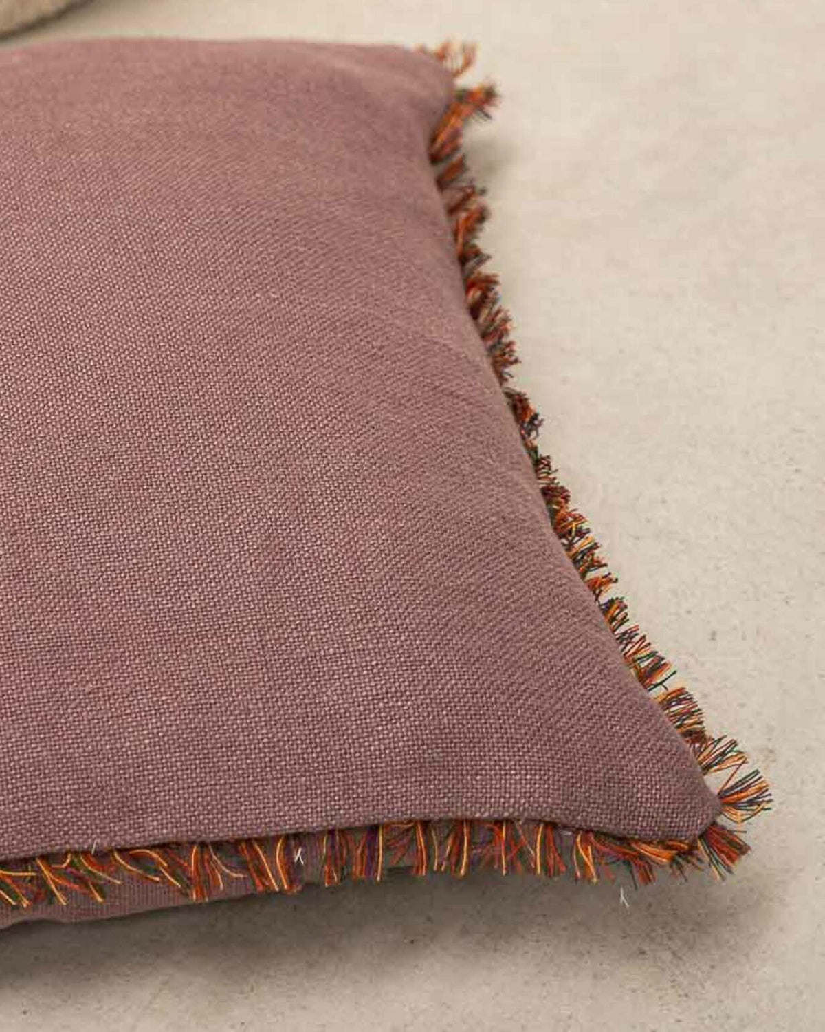 El Mercader fabric by Coordonné in Aubergine, shown in a styled room