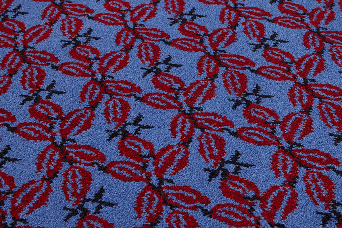 Fleurs Etoilees Rug by Le Manach shown in a room setting (view 1)