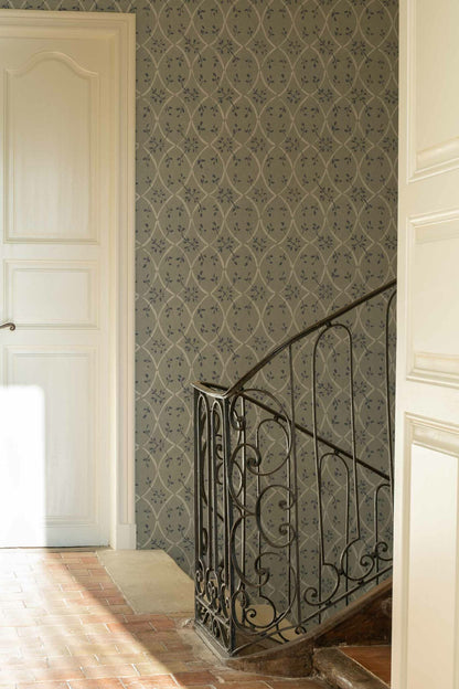 Forja wallpaper by Coordonné in Avio, shown in a styled room
