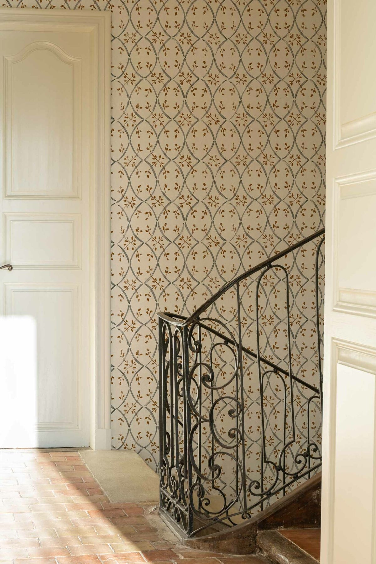 Forja wallpaper by Coordonné in Plata, shown in a styled room