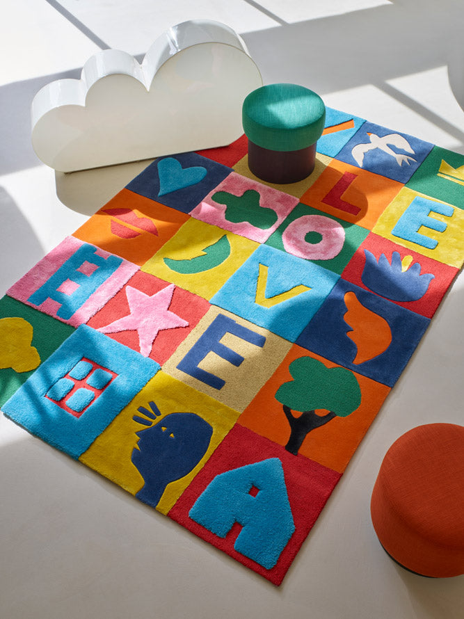 Game of Love Rug by Pierre Frey shown in a room setting (view 1)