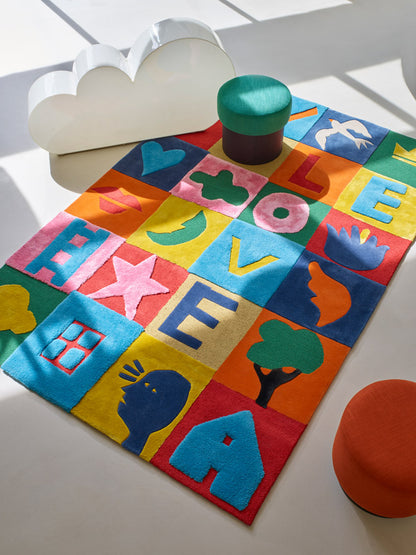 Game of Love Rug by Pierre Frey shown in a room setting (view 1)