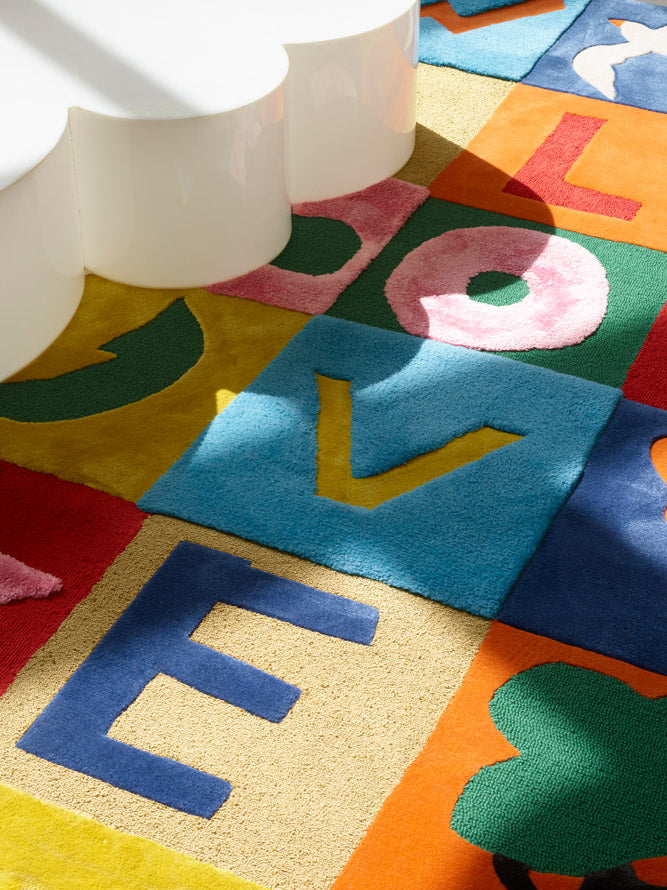 Game of Love Rug by Pierre Frey shown in a room setting (view 2)