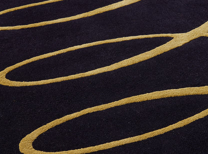 Gotham Tuft Rug by Pierre Frey shown in a room setting (view 1)