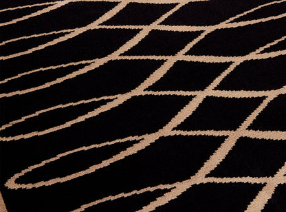 Gotham Wilton Rug by Pierre Frey shown in a room setting (view 1)