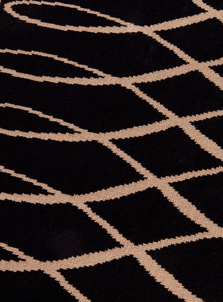 Gotham Wilton Rug by Pierre Frey shown in a room setting (view 2)