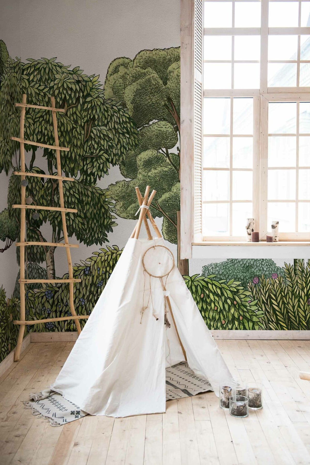 Green Forest mural by Coordonné in Natural, shown in a styled room