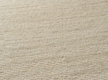 Kanjiroba Rug by Pierre Frey shown in a room setting (view 1)