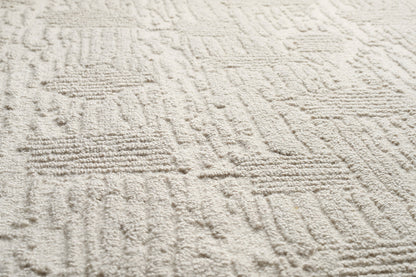 Labyrinthe Boucle Rug by Pierre Frey shown in a room setting (view 1)