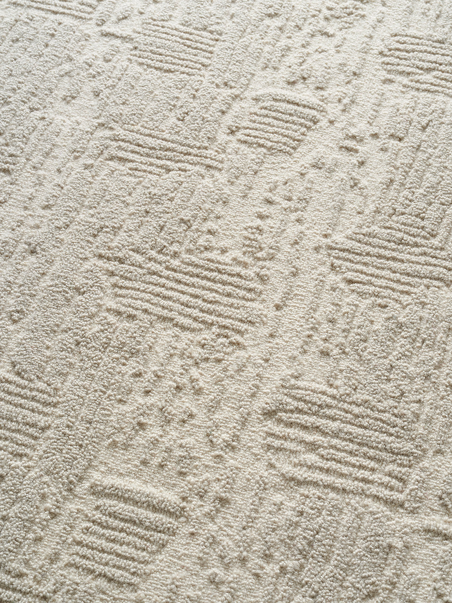 Labyrinthe Boucle Rug by Pierre Frey shown in a room setting (view 2)