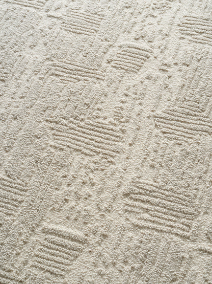 Labyrinthe Boucle Rug by Pierre Frey shown in a room setting (view 2)